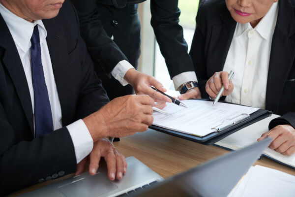 Advocates checking some legal papers